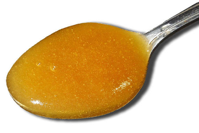 a spoon of umf manuka honey image
