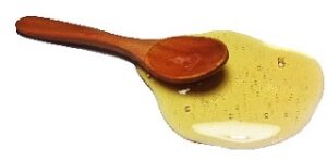 spoon of liquid honey