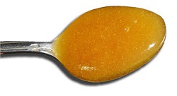 spoon of cream honey image