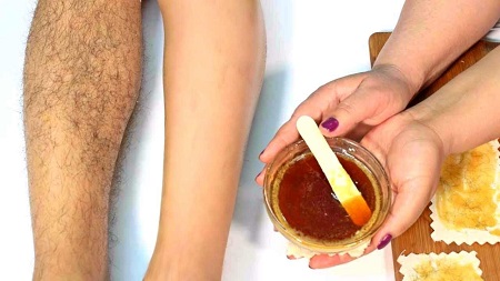wax your body hair with honey image